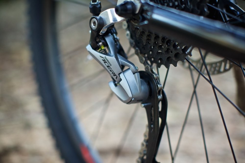 Shimano Acera 9-speed derailleurs work with 10-speed gearing.