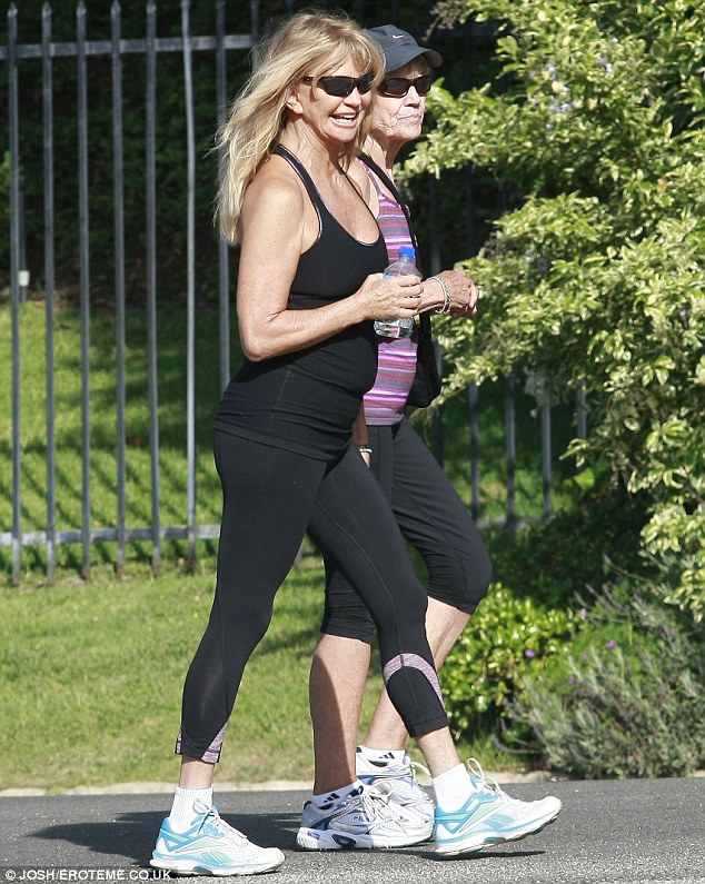 Girls time: Goldie proves that you are never too old for a workout session with your best friend