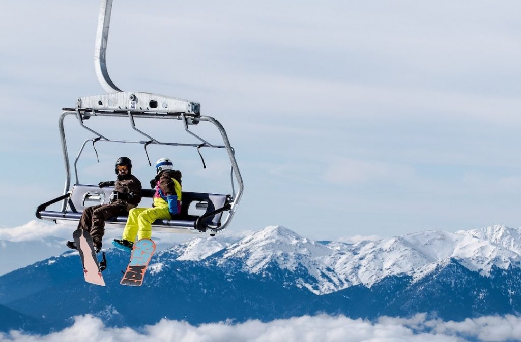 Two people in a chairlift at Parnassos Ski Resort in Greece