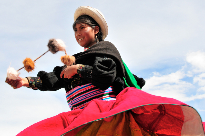dancer in traditional Andean dress at the Fiesta de la Candelaria Lake Titicaca Peru